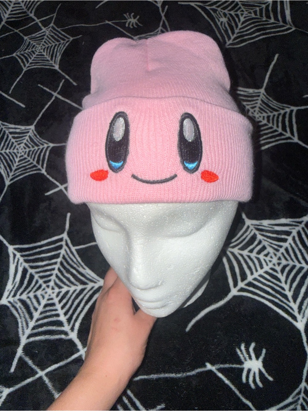 Pink Kirby beanie with embroidered face